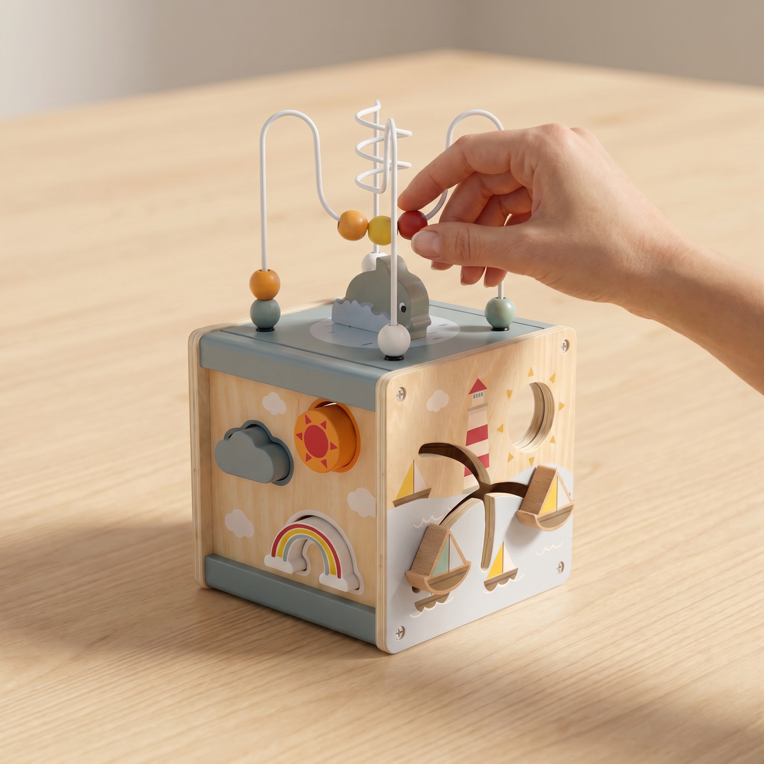 Wooden 5-in-1 Activity Cube for Toddlers — a child playing with it