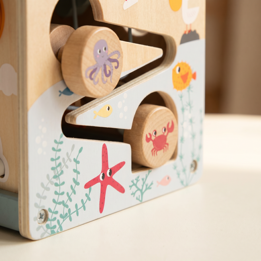 Wooden 5-in-1 Activity Cube for Toddlers — close-up of the wooden pieces
