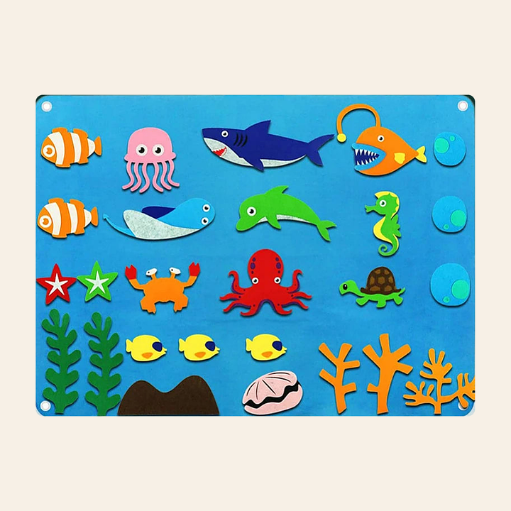 Blue felt ocean story board with detachable felt sea creatures - shark, dolphin, octopus and clownfish