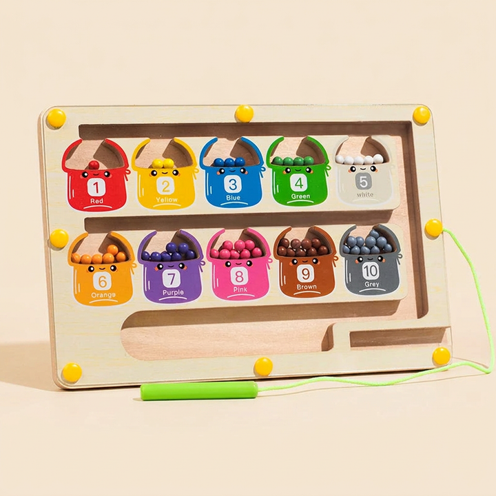 Wooden magnetic bead maze on warm cream - ten colored numbered wells from 1 to 10 with a green magnet pen