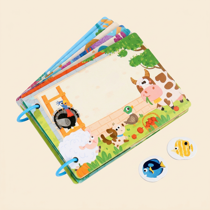 Ring-bound Montessori busy book on warm cream - illustrated cardboard pages on blue binder rings with detachable picture cards