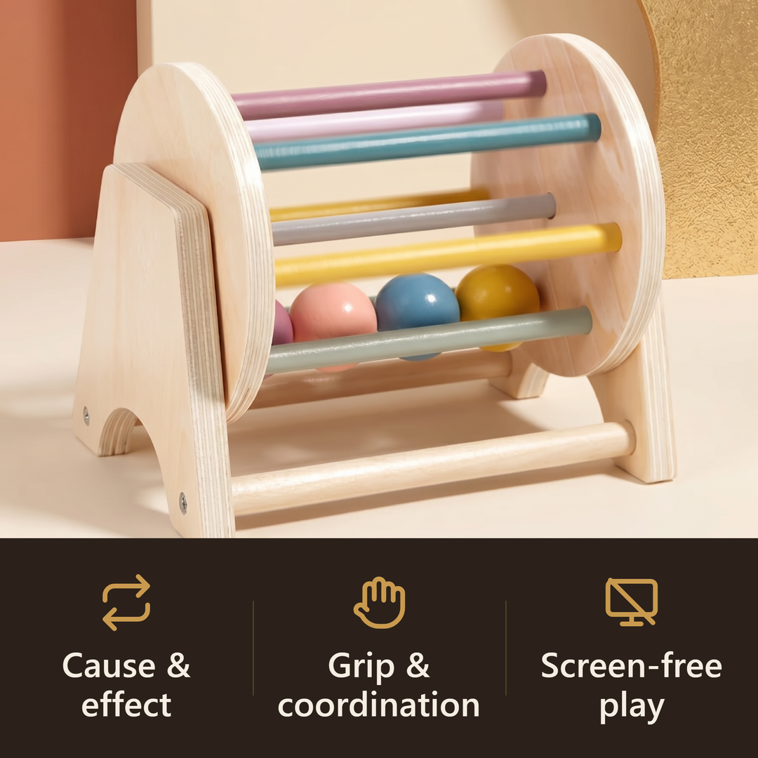 A child spinning the wooden drum, pastel balls tumbling inside, warm cream background.