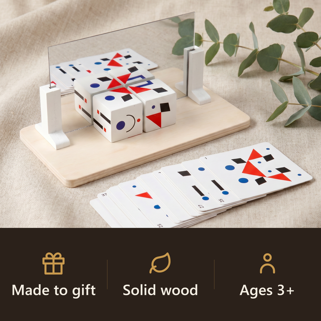 The Montessori mirror puzzle styled as a gift: wooden mirror base, piece set, and pattern cards on linen.