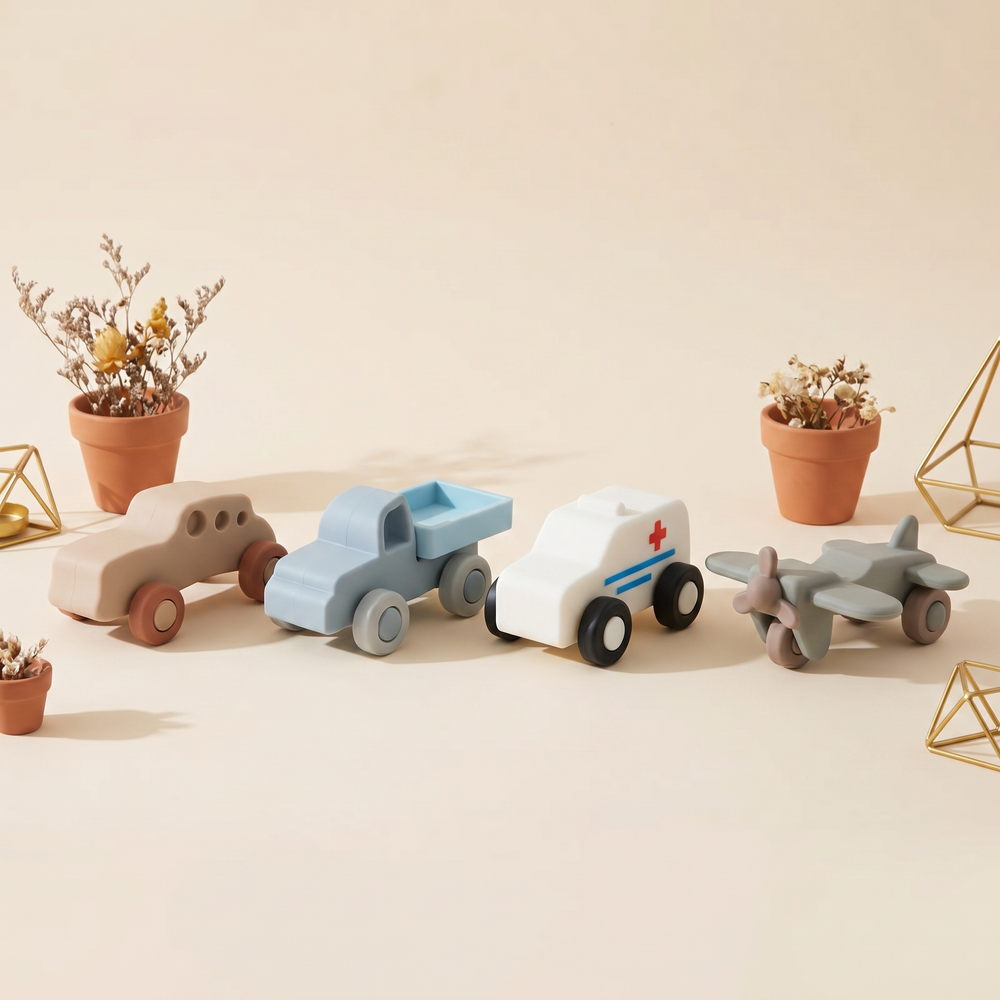 The soft silicone vehicle set - car, lorry, ambulance and aeroplane in soft pastel tones