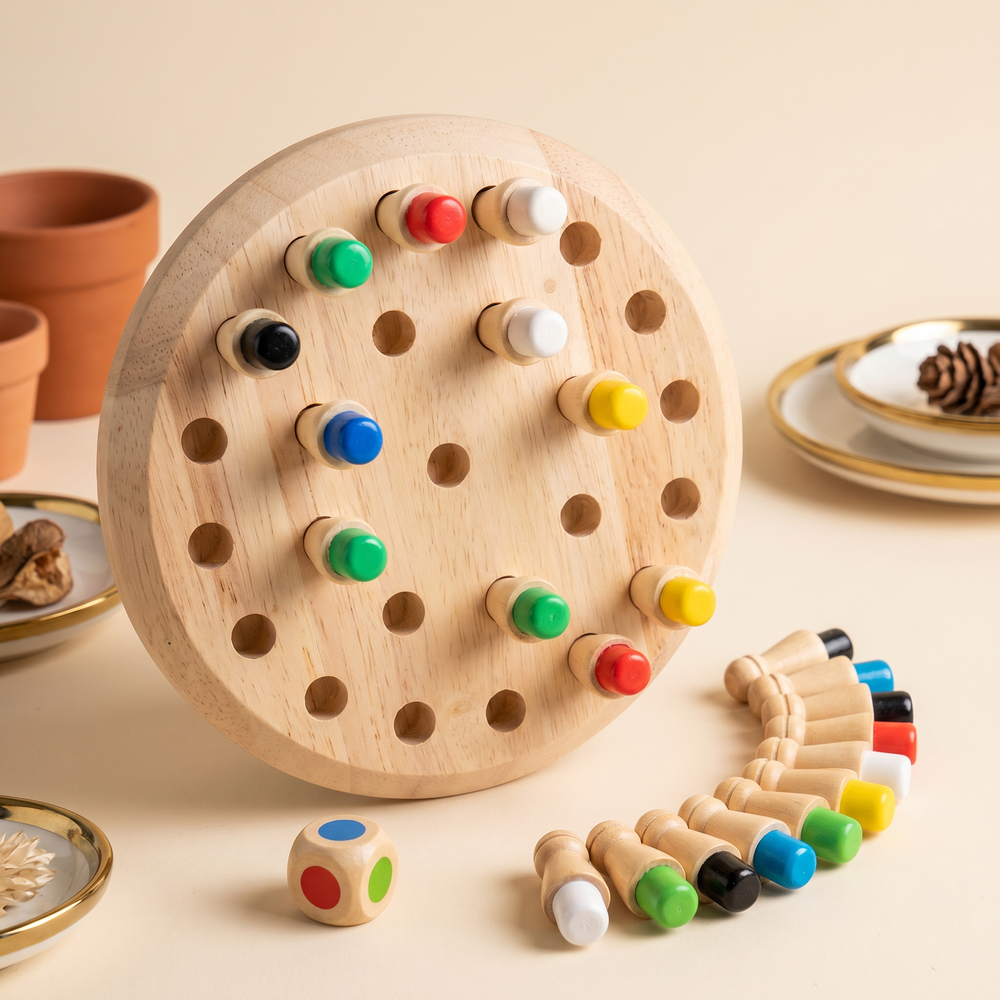 Three-quarter view of the round wooden memory board with colored pegs and the color die