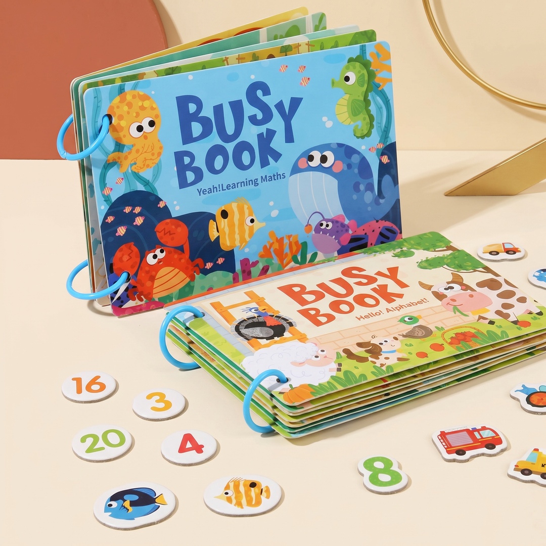 Two busy book themes fanned side by side on their binder rings with a spread of picture cards