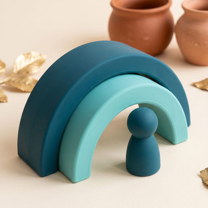Close-up of soft matte silicone arches and a rounded peg doll