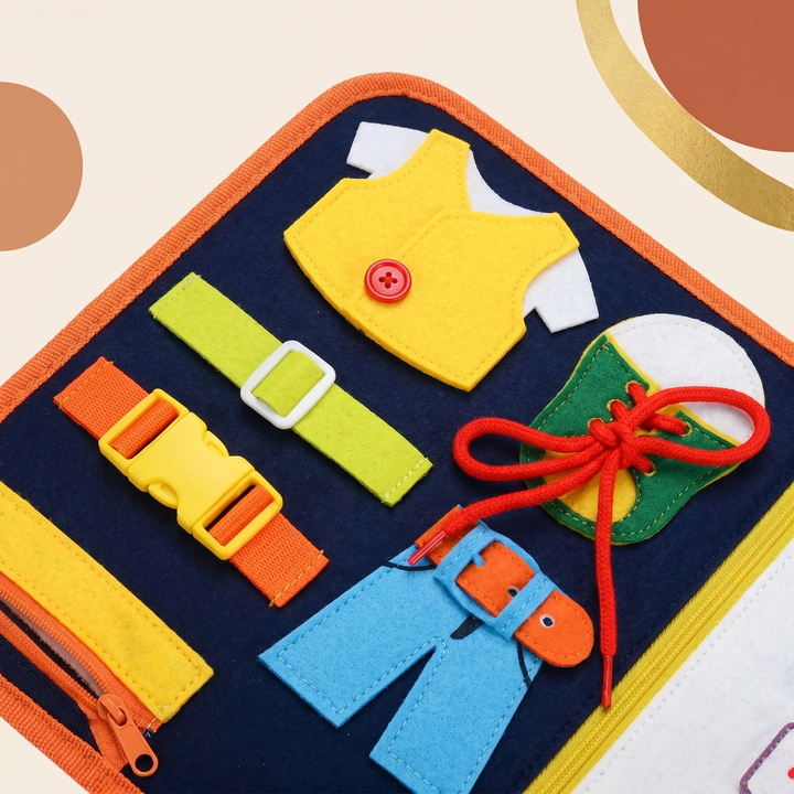 Close-up of the dressing-skills page - zipper, buckle, belt, button and laces in colorful felt