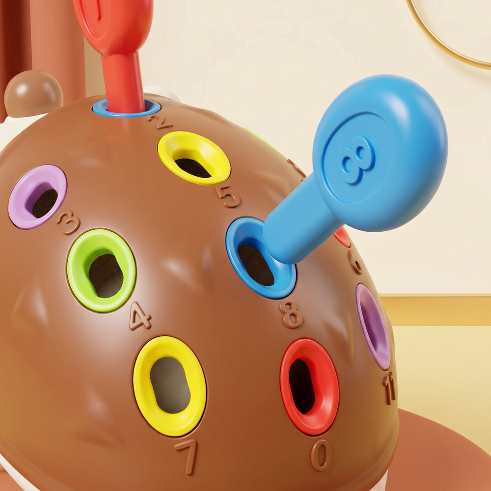 Close-up of the numbered color-ringed holes on the hedgehog with a peg being seated