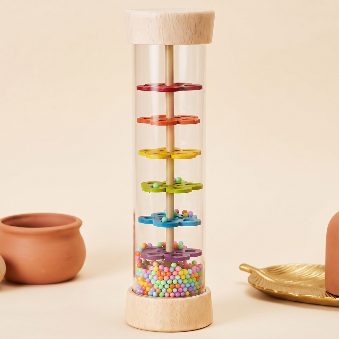 Close-up of the rainbow flower baffles and colorful beads inside the clear rainmaker body