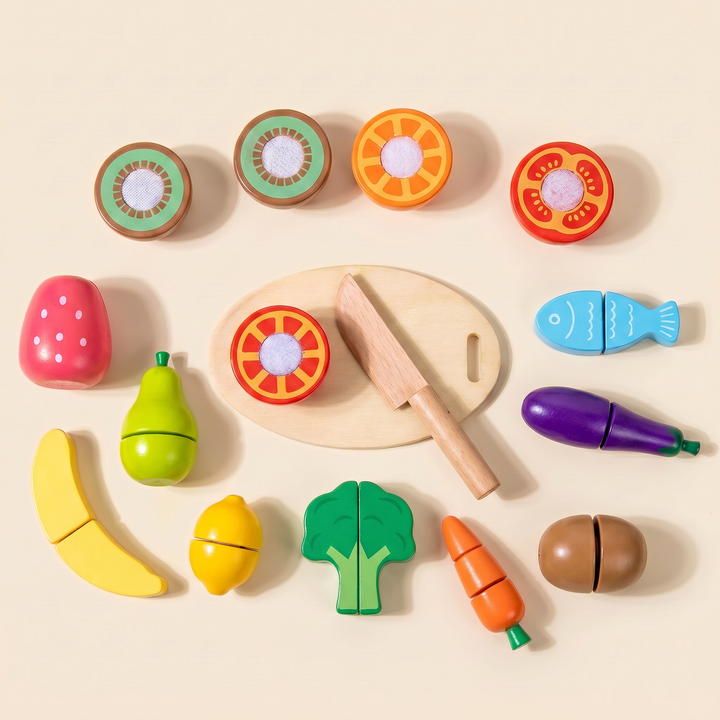 Overhead view of the full wooden cutting set with foods, knife and board