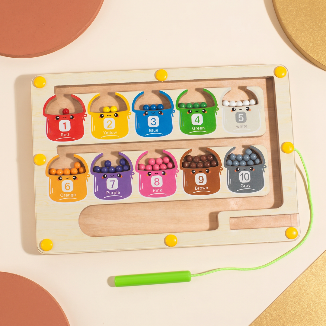 Top-down of the wooden bead maze showing all ten colored numbered wells, 1 to 10