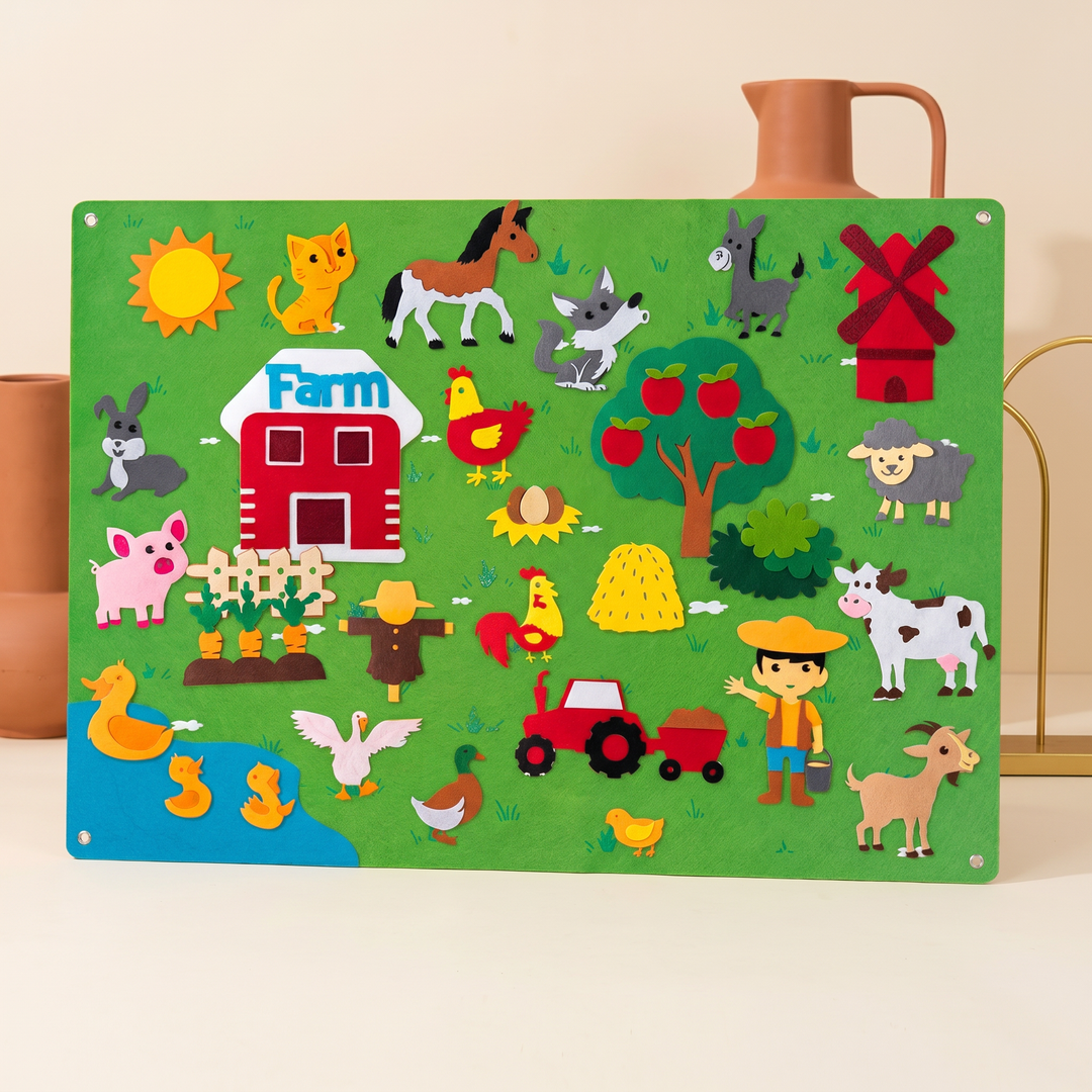 Felt farm story board fully arranged with barn, animals, tractor, windmill and farmer